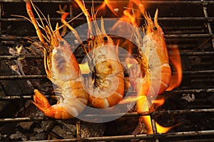 Grilled prawns on flaming