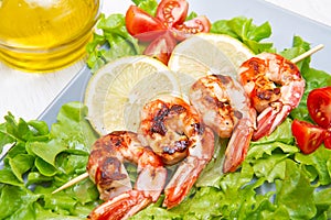 grilled prawns with salad and cherry tomatoes photo