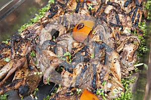 Grilled quails at an oriental restaurant buffet