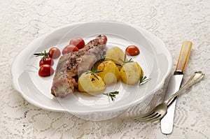 Grilled rabbit leg and potato