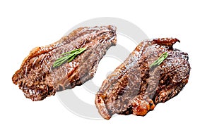 Grilled ramp cap steak on a stone chopping Board. Isolated on white background.