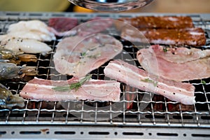 Grilled raw meat beef and pork with shrimp and squid. yakiniku grill buffet restaurant