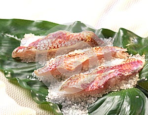 Grilled red mullet fillets on a bed of coarse salt