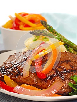 Grilled rib-eye steak with mashed potatoes