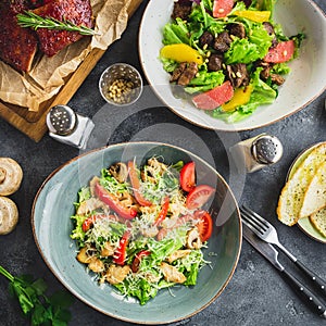 Grilled ribs with buckwheat, salad with citrus and grilled chicken