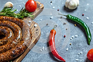 Grilled or Roasted spiral pork sausages with rosemary, salt and peper