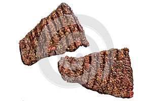 Grilled rump steak with spices. BBQ beef. Isolated on white background. Top view.