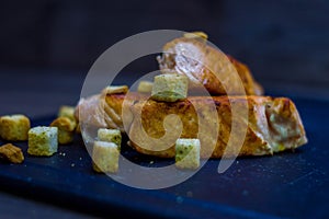 Grilled salmon with croutons