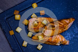 Grilled salmon with croutons