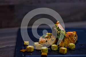 Grilled salmon with croutons