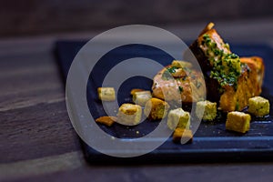 Grilled salmon with croutons