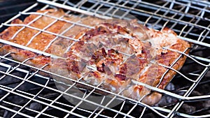 Grilled salmon, fish on the barbecue grill, close-up, 4K