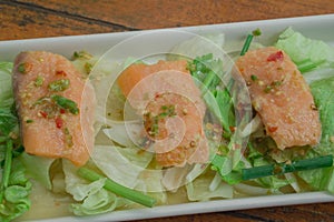 Grilled Salmon with fresh salad and lemon. Selective focus