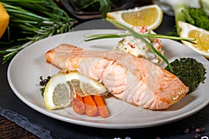 grilled Salmon with lemon, herbs and pesto