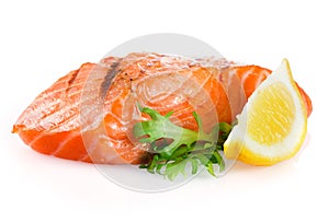 Grilled salmon with lemon on white
