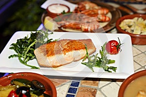 Grilled salmon in spanish restaurant