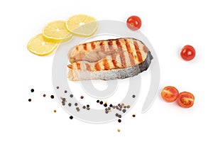 Grilled salmon steak isolated on white background