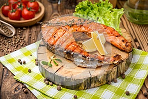 Grilled salmon steak on a plate made