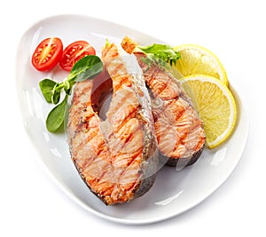 Grilled salmon steak slices