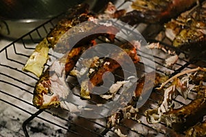 Grilled salmon steaks on a grill. Fire flame grill. Restaurant and garden kitchen.