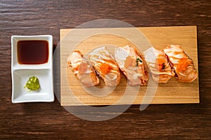 grilled salmon sushi on plate