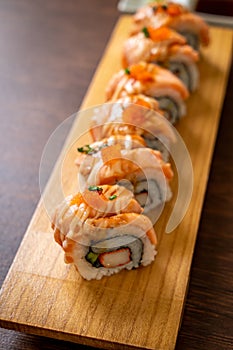 grilled salmon sushi roll with sauce