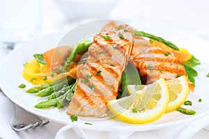 Grilled salmon with vegetables photo