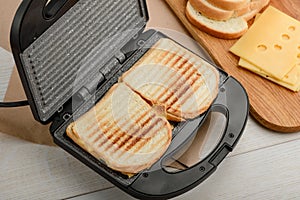 Grilled sandwiches in panini press photo