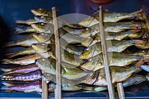Grilled sardines in an Asian market. Here the fish market is really popular and the food