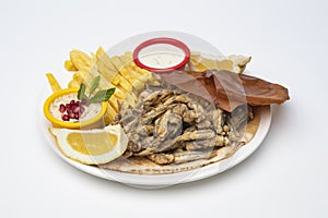 Grilled Sardines plate served with sauce  on white