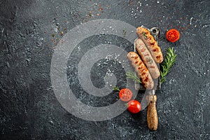 Grilled sausage with with sauces. Grilling food, bbq, barbecue. place for text, top view