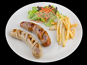 Grilled sausage steak served with french fries and salads