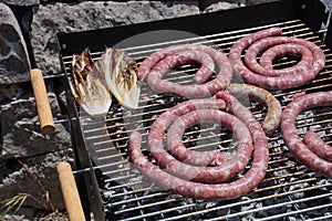 Grilled sausage, typical food of the trips.