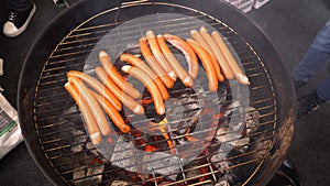 Grilled sausages. Closeup of sausage on the grill. Home-made Sausages. Bavarian sausages