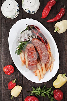 Grilled sausages and french fries