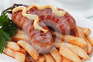 Grilled sausages and french fries