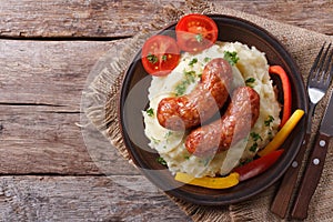 Grilled sausages and mashed potatoes, top view horizontal