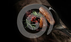 Grilled Sausages, Pomegranites and Onions