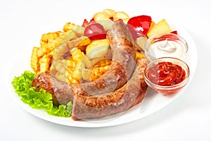 Grilled sausages with potatoes fries solated on white background