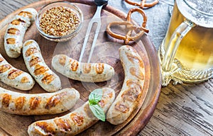 Grilled sausages with pretzels and mug of beer