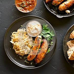 Grilled sausages with sauerkraut and horseradish