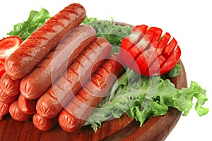 Grilled sausages served on wood