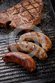 Grilled Sausages and T-Bone Steak