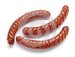 Grilled sausages on white background