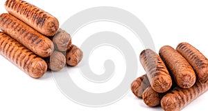 Grilled sausages on a white isolated background, close-up, horizontal view