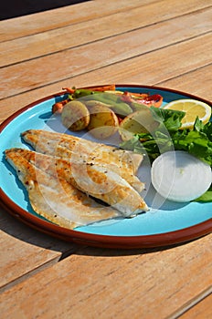 Grilled sea bass, confit potatoes and vegetables from the legendary fishmonger we stopped by in Bodrum.