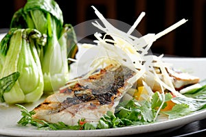 Grilled sea bass fillet with ginger and Pak Choy photo
