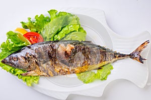 Grilled sea fish from above.