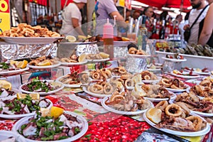 Grilled seafood at the food market Ballaro in Palermo