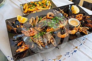 Grilled seafood plate, mediterranean cuisine
